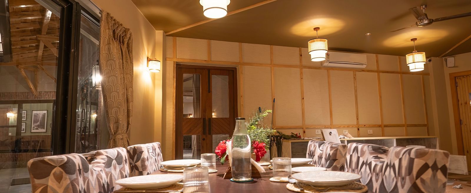Well-set table in warm lighting at The Chamomile Estate.