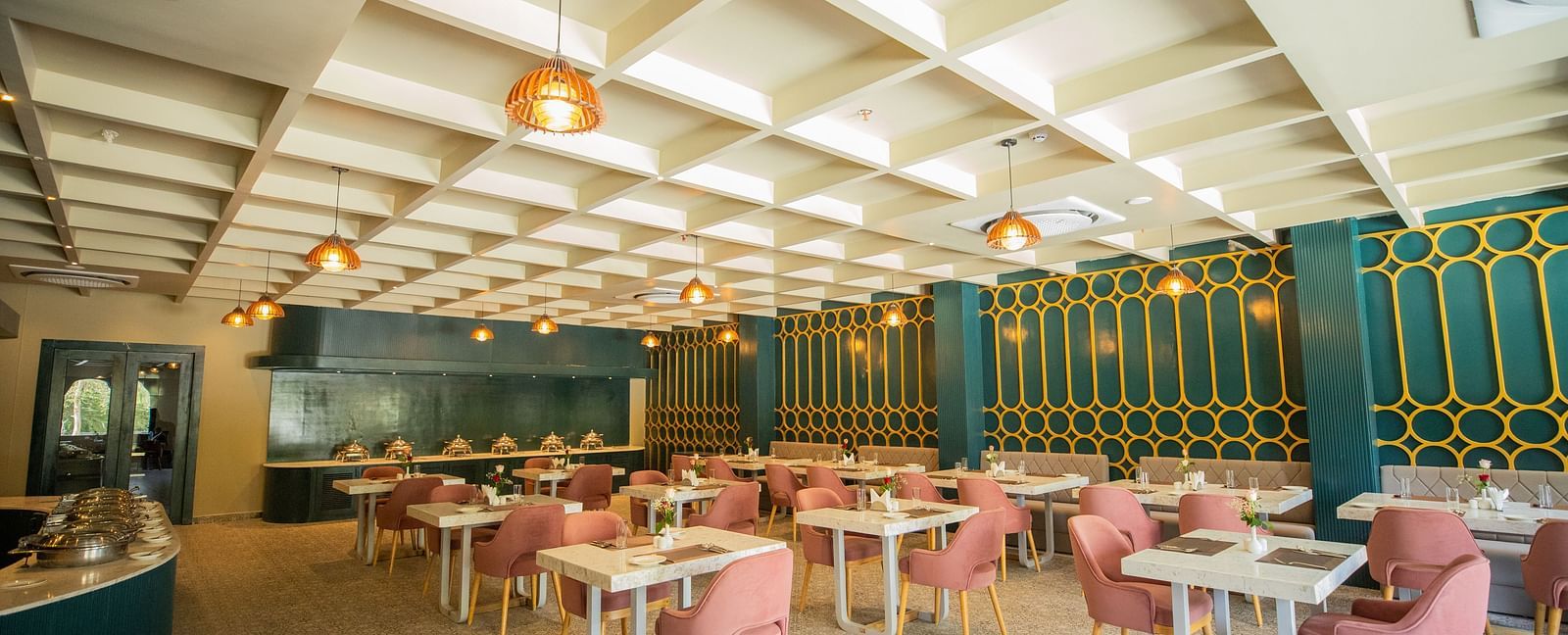 A dining setting of Blue Salt and Coffee at Essentia Luxury Resort & Spa, Udaipur. 