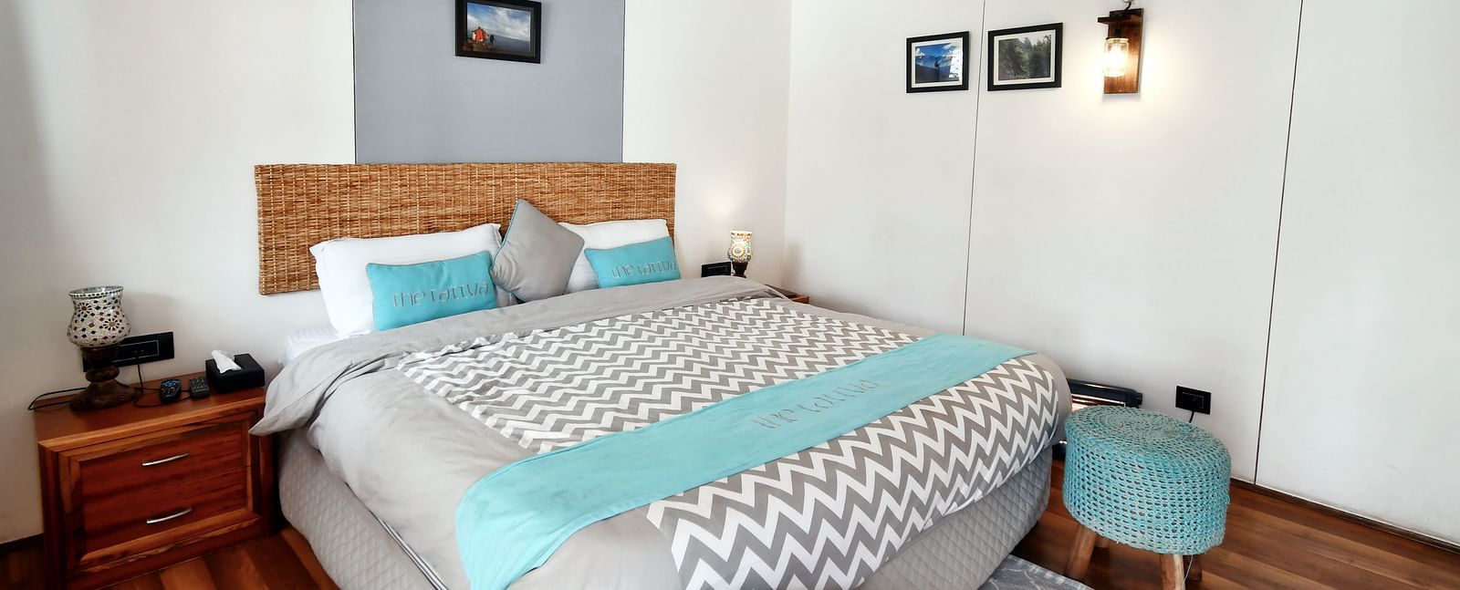 image of the deluxe room featuring a plus double bed with ample of natural light - The Tattva Boutique Resort