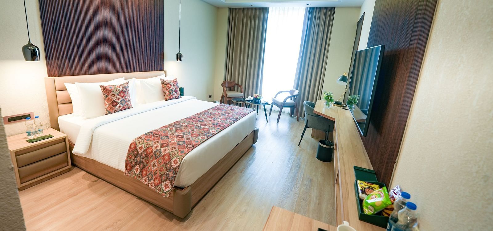 An image of Superior Temple View Room with a queen size bed and modern amenities - NAMAMI BY ZENQ BANKHANDI