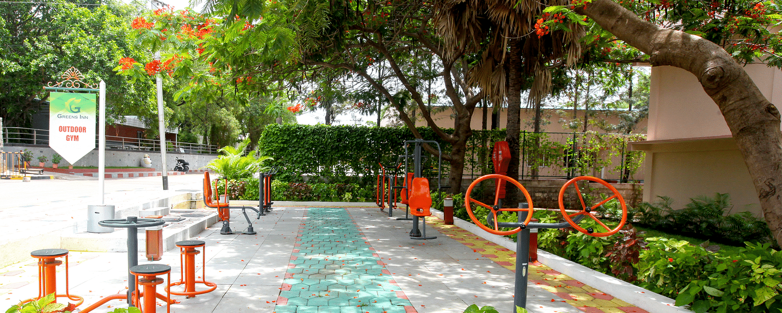 Outdoor games placed under trees at Greens Inn - Fun Activities in Hyderabad.