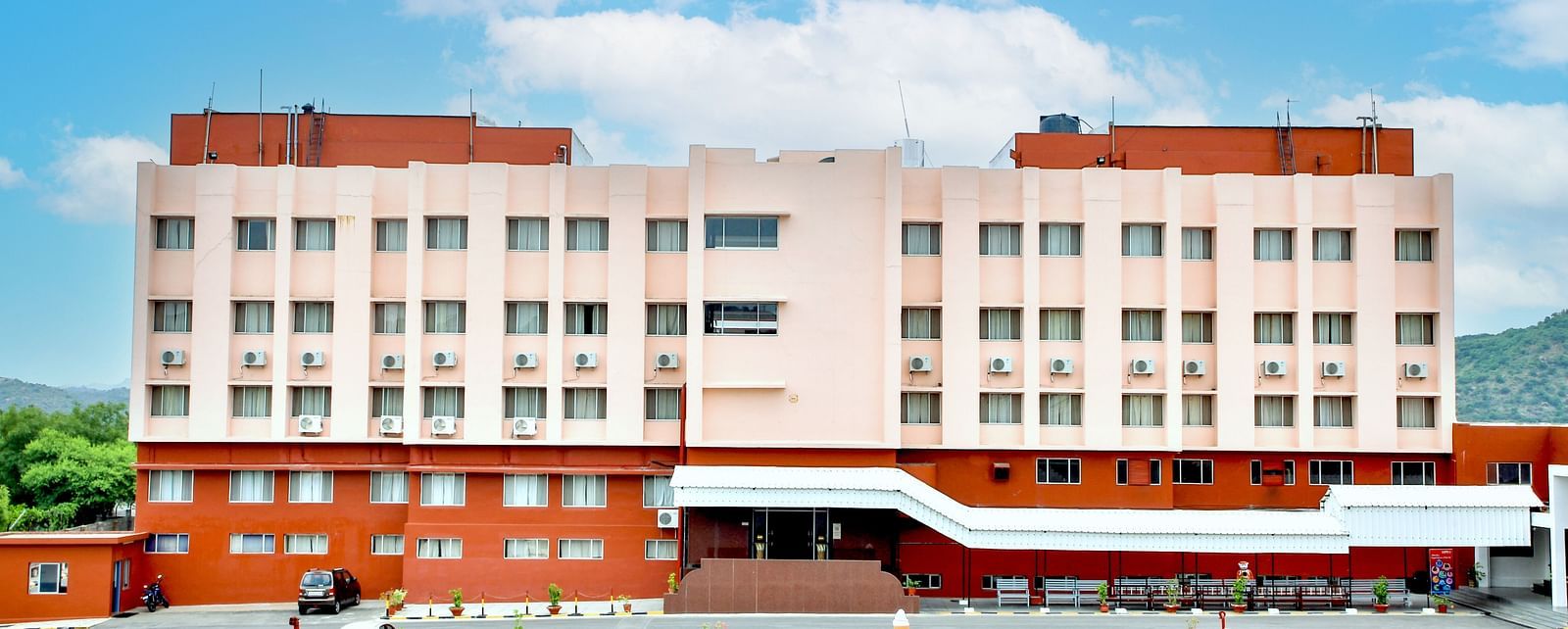 A long shot of the facade of Hotel Sahara in Ramoji Film City - Hotel Exterior in Hyderabad.
