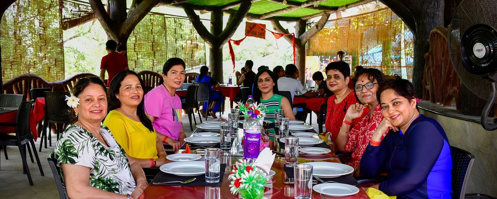 A group of ladies posing the dinning table | Diamond Parks, Pune