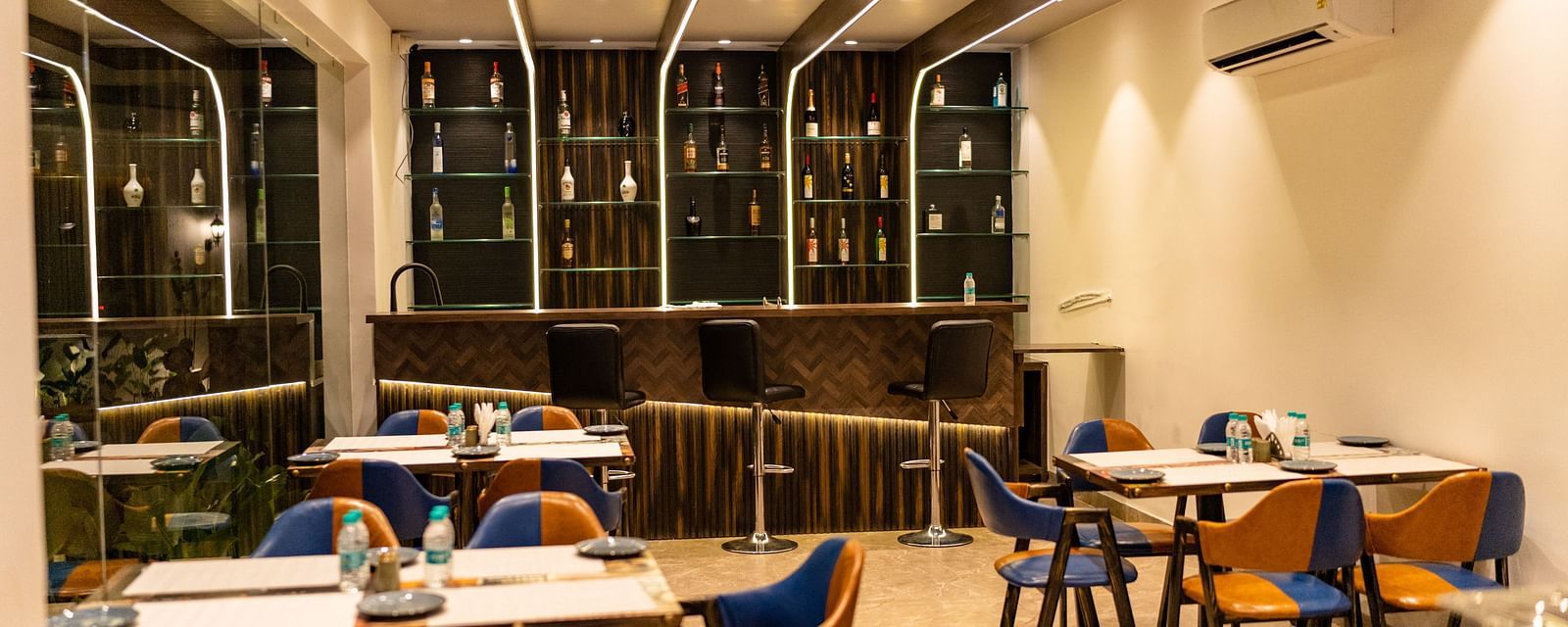 seating arrangements inside the in-house bar - The Tanisi Hotels & Resorts, Goa