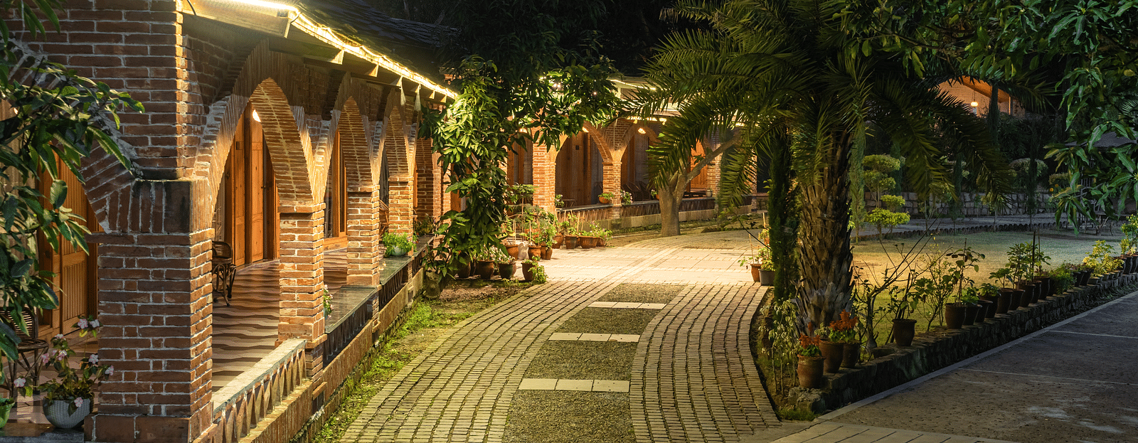 An exterior angle of The Sylvan Retreat, Dehradun at night.