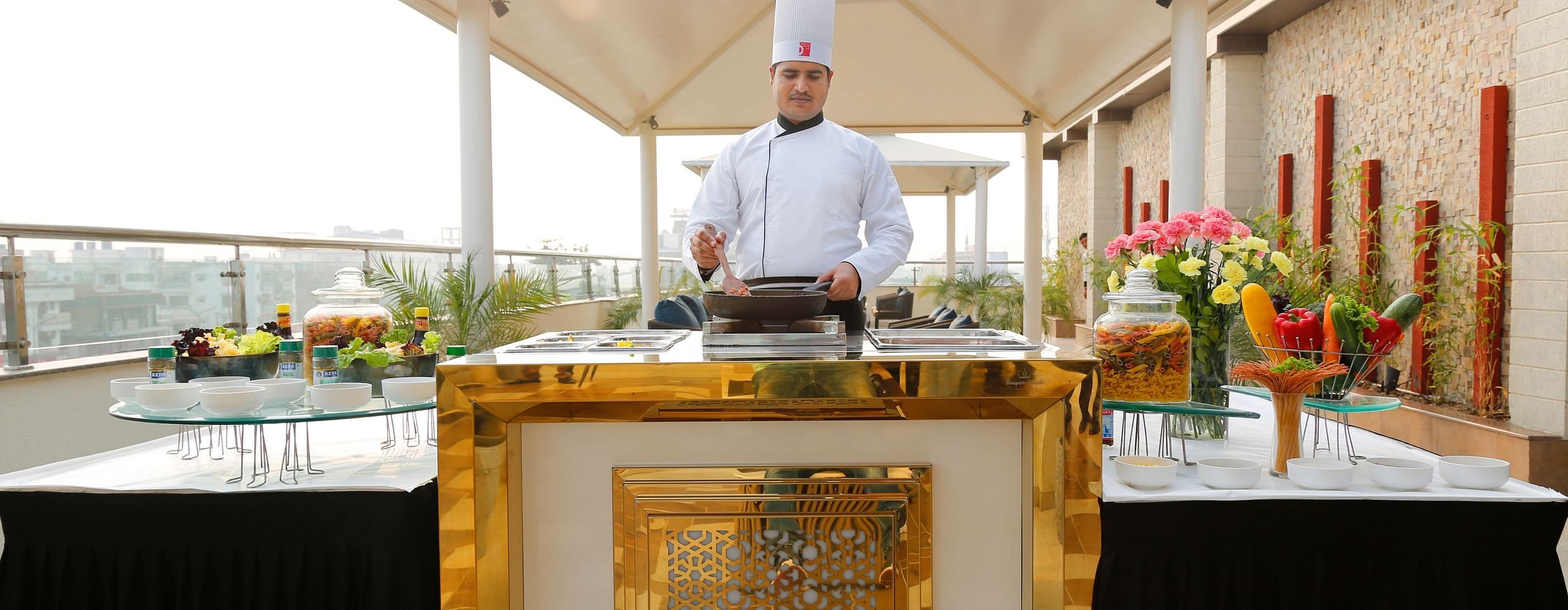 Sapna Clarks - a chef cooking at the rooftop 1