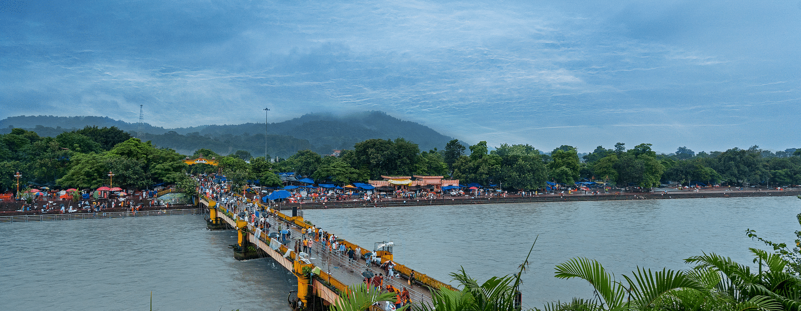 View from the Hotel of a bridge with people walking on it - Ganga Lahari, Haridwar