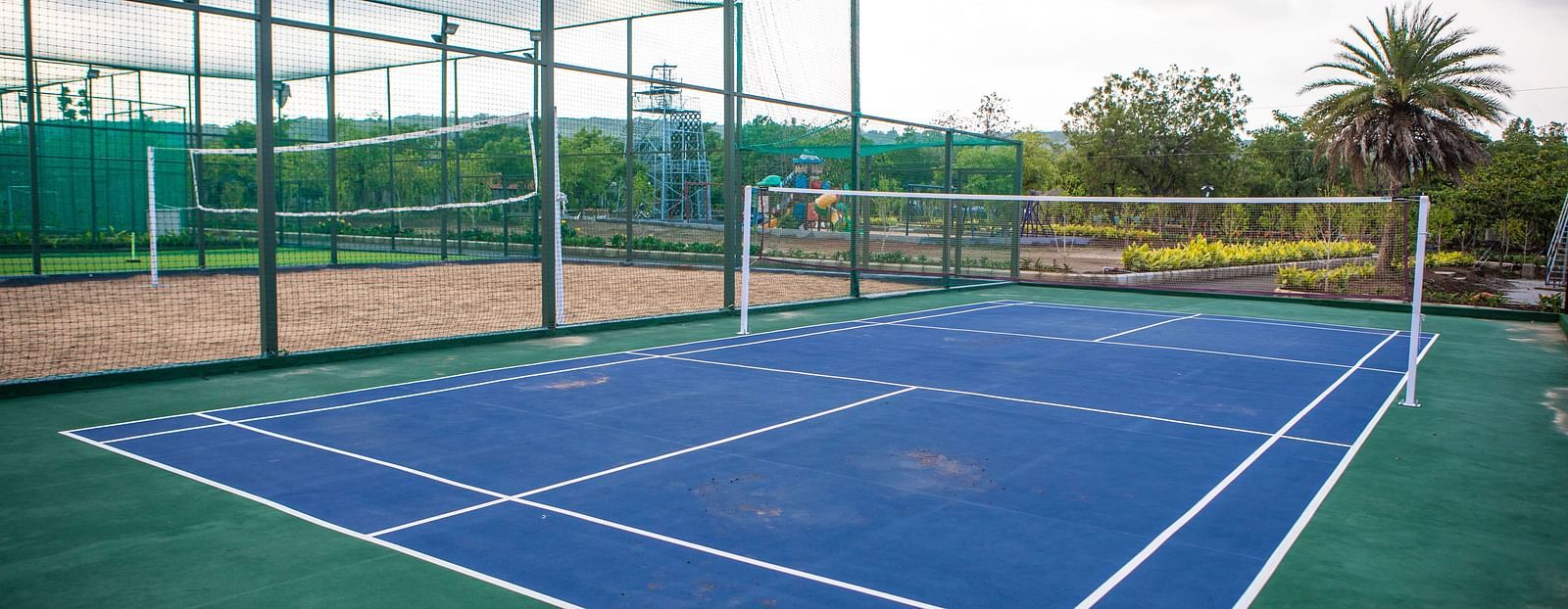 An image of a badminton court - Trance Veechika Resort, Vikarabad