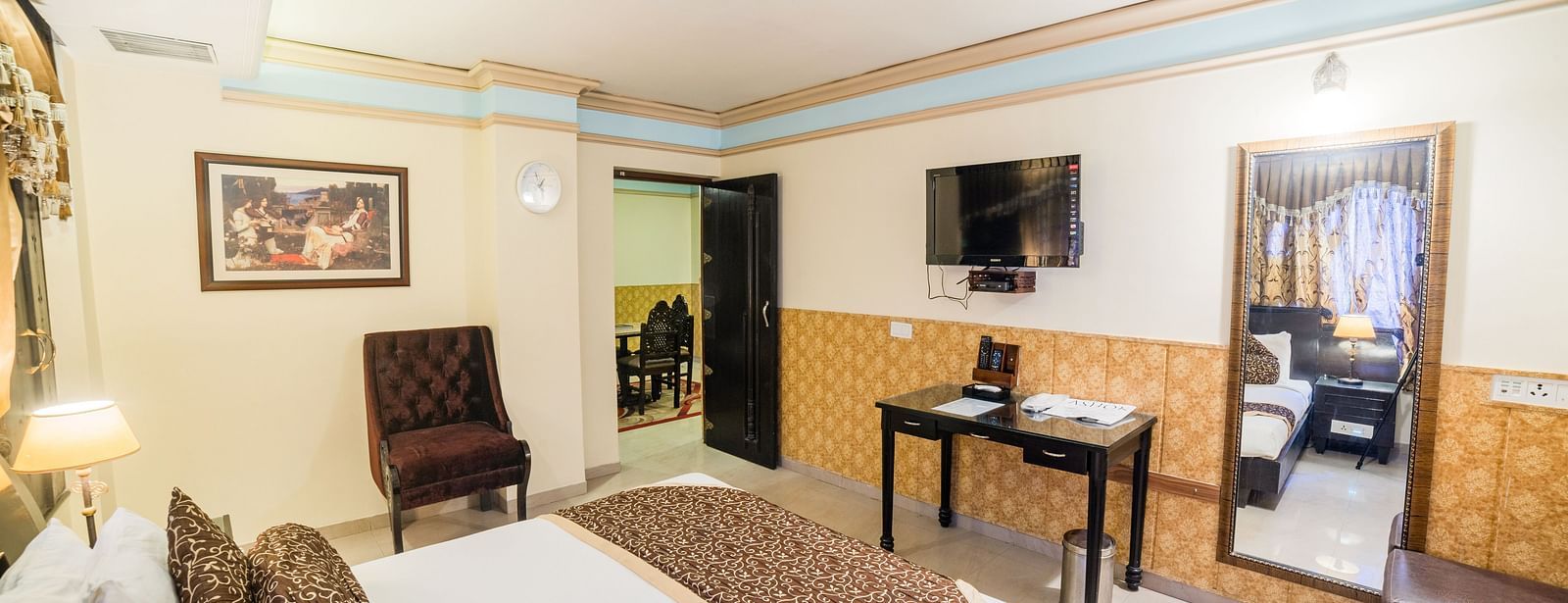 Queen Room featuring a bed and interior decor. - Hotel Ashok Nagpur
