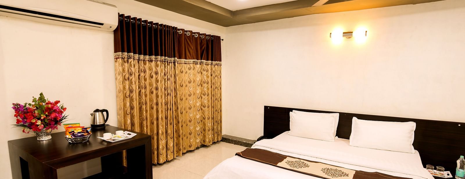 A room with with a double bed and work desk at Saavaj Resort