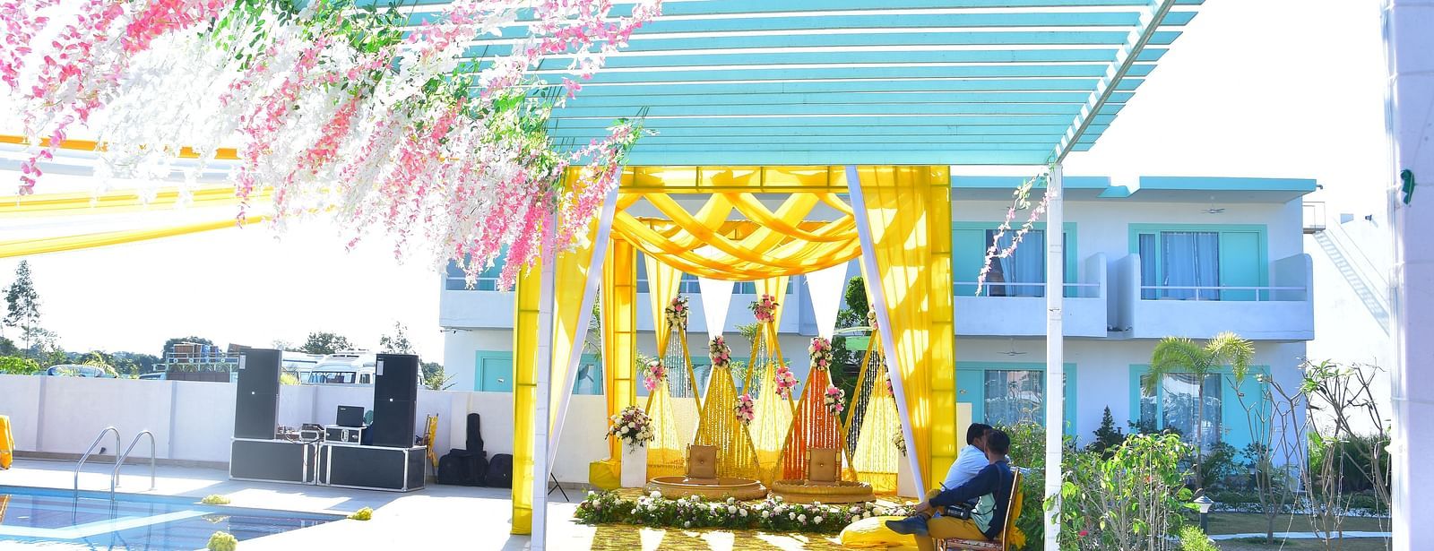 Outdoor haldi decor with canopy and floral elements at Vedikant Resorts The Mallard Corbett.