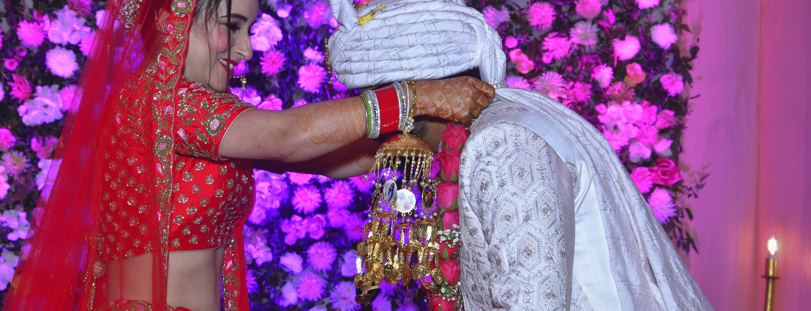 Bride and groom exchange garlands during a traditional ceremony at Vedikant Resorts The Mallard Corbett.