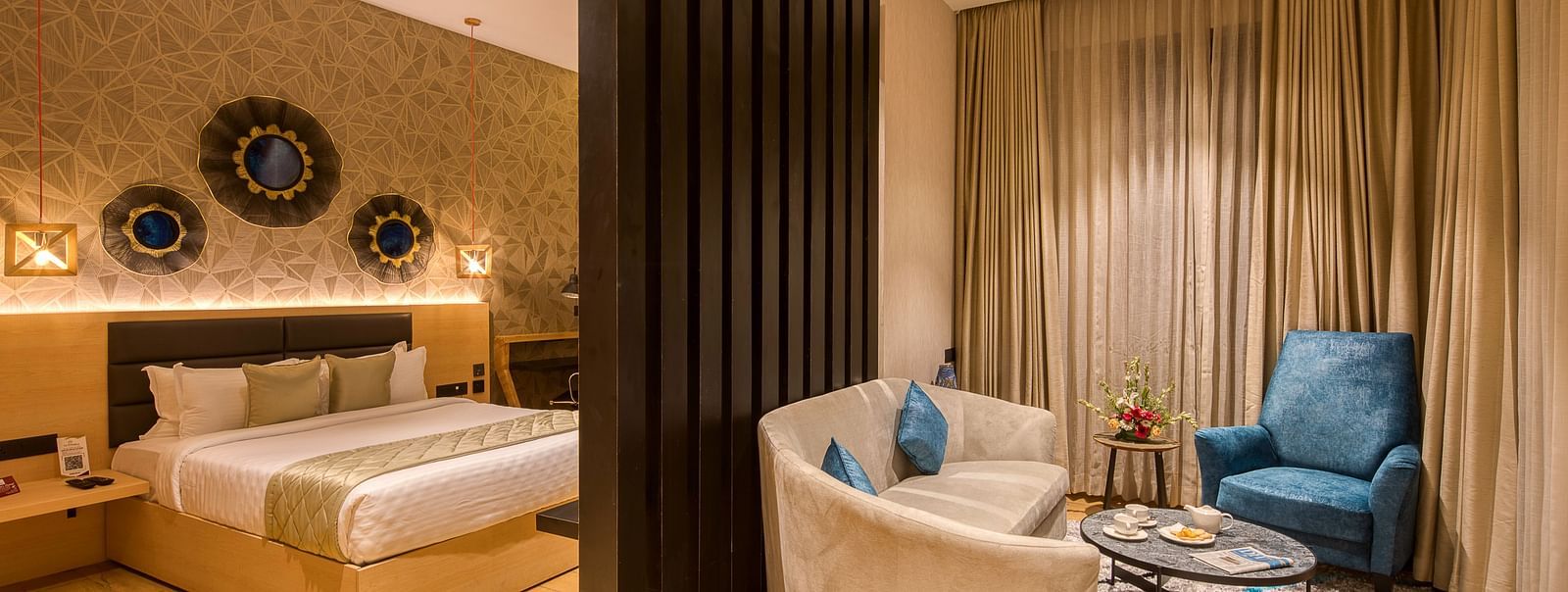Double bed and the living area in the Sumo Suite at Le Foliage by TGI, Bangalore
