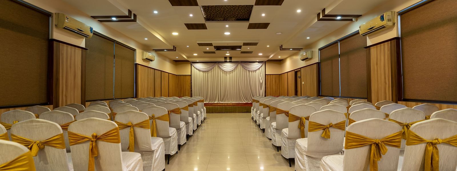 Seating arrangements inside a banquet hall - Hotel Pai Vista, KR Road
