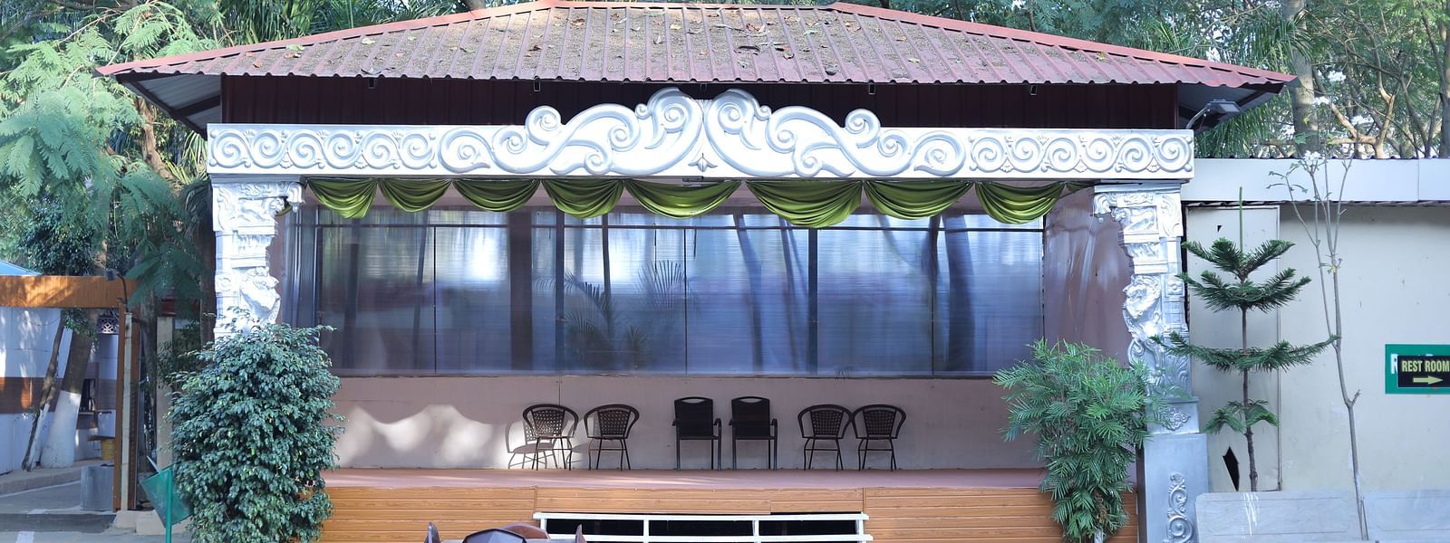Entrance to an event hall at The Meenakshi Resort by Welcome Inn Hospitality, Bangalore.