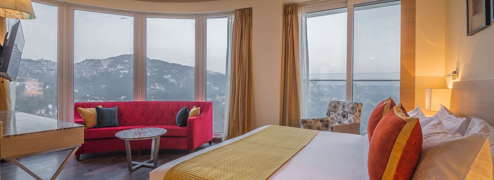 image of a room with french windows with a picturesque view outside