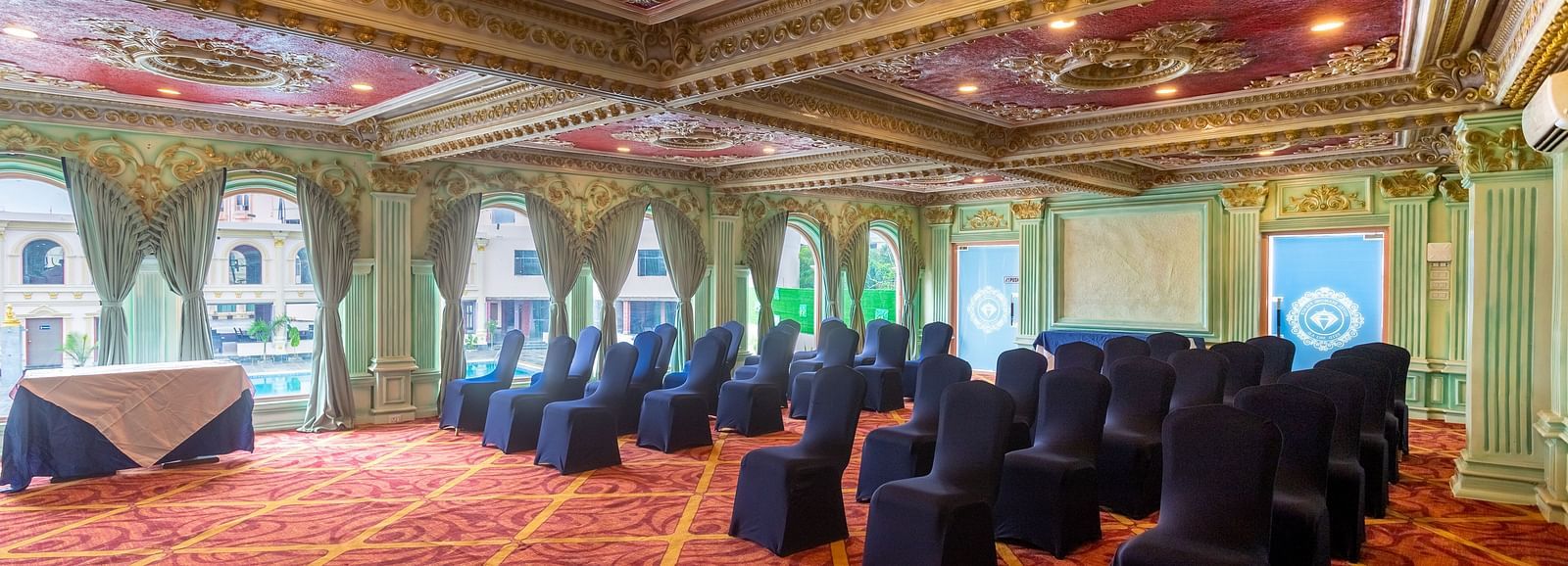 Conference room with chandeliers and projector screens