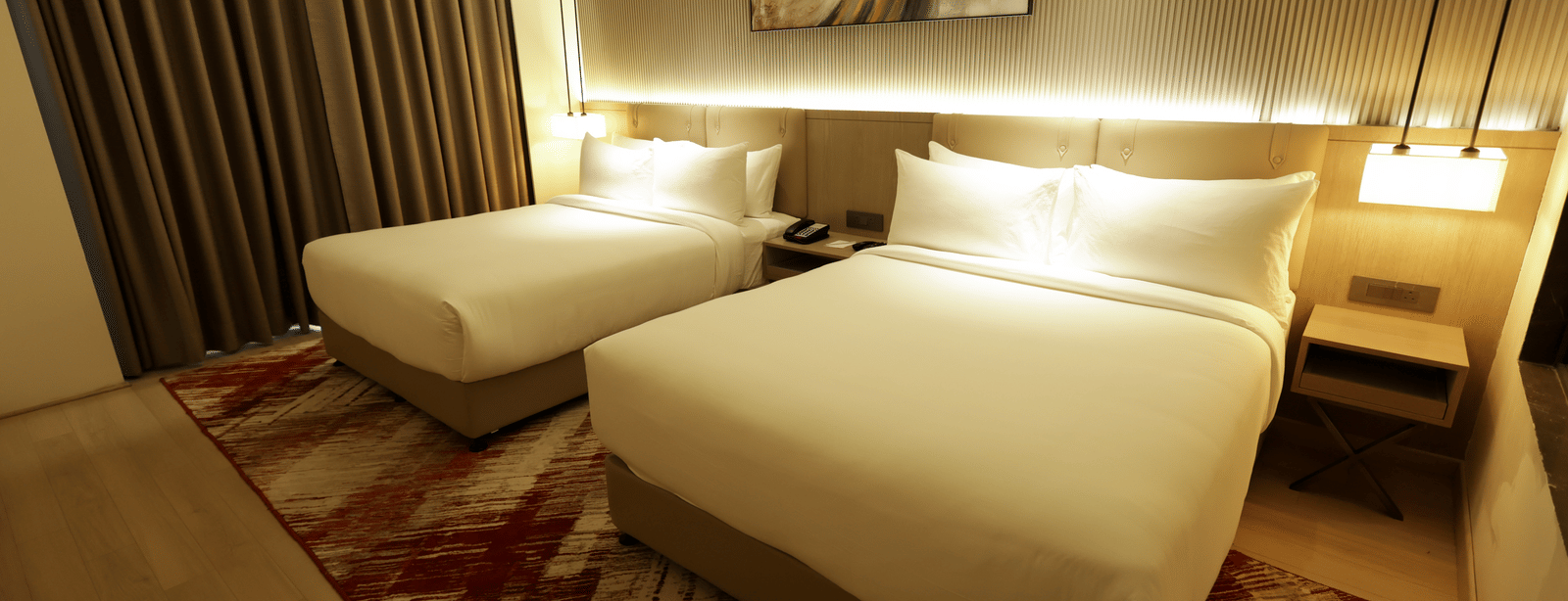 Room with soft lighting and warm tones for a relaxing stay at Ramada by Wyndham Sonipat Murthal