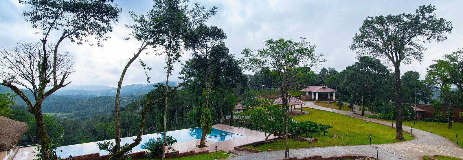 trees on lawn - Tapovana, Sakleshpura