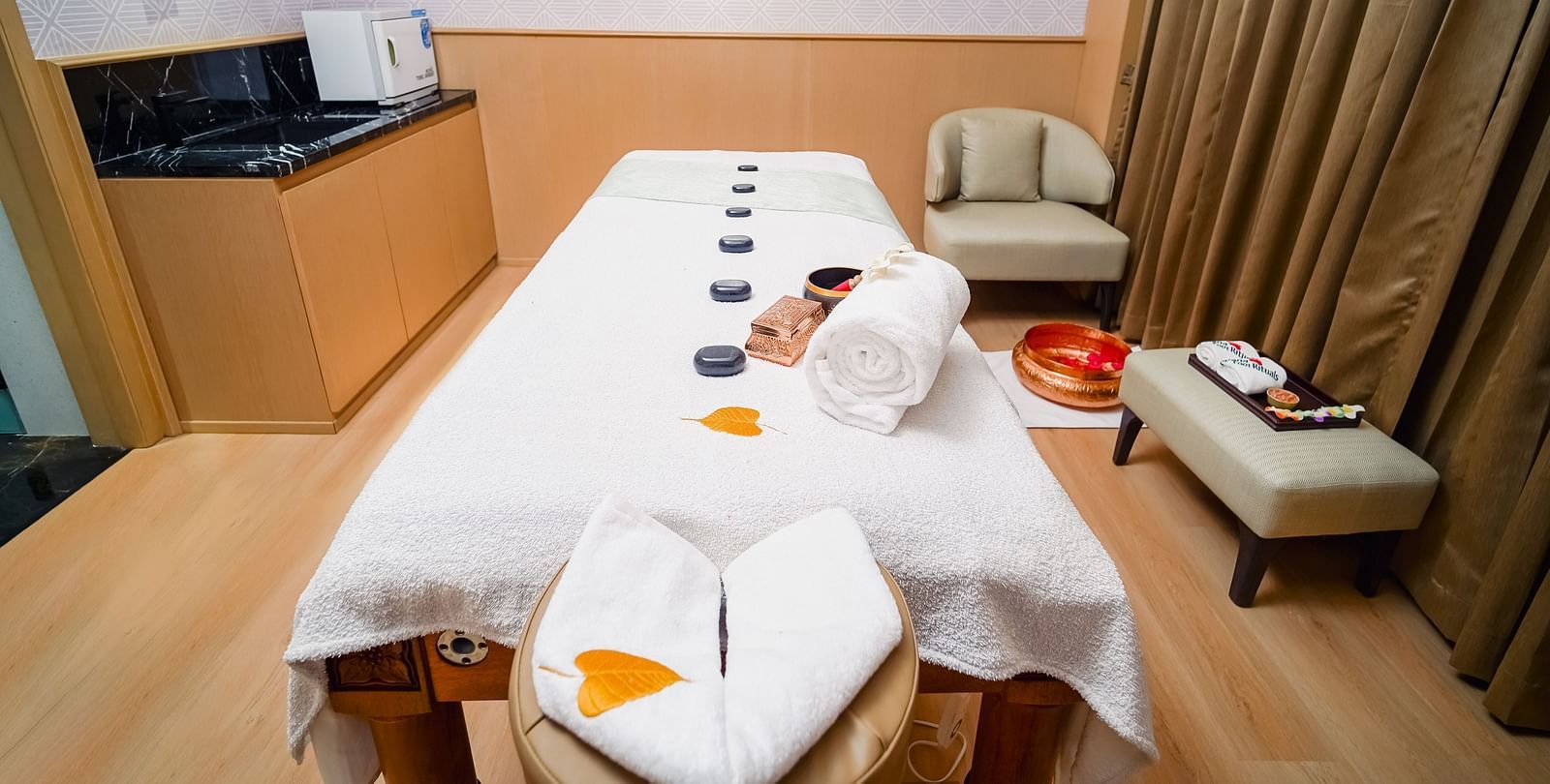 A treatment room at our spa in Madurai with comfortable seating arrangement for the guest - Grand Madurai by GRT Hotelss