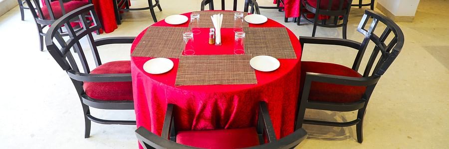 seating in the restaurant at White pearl suites by rosetum 