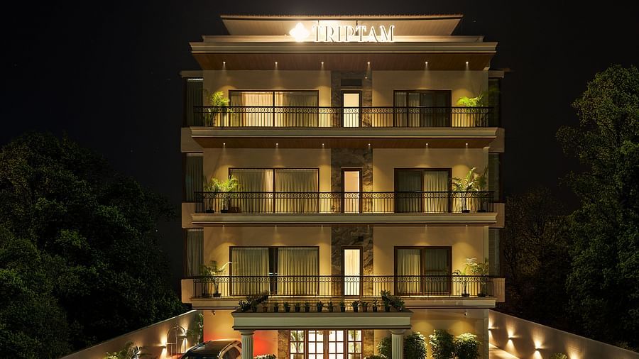 exterior facade of Triptam Hotel, Vrindavan lit up at night