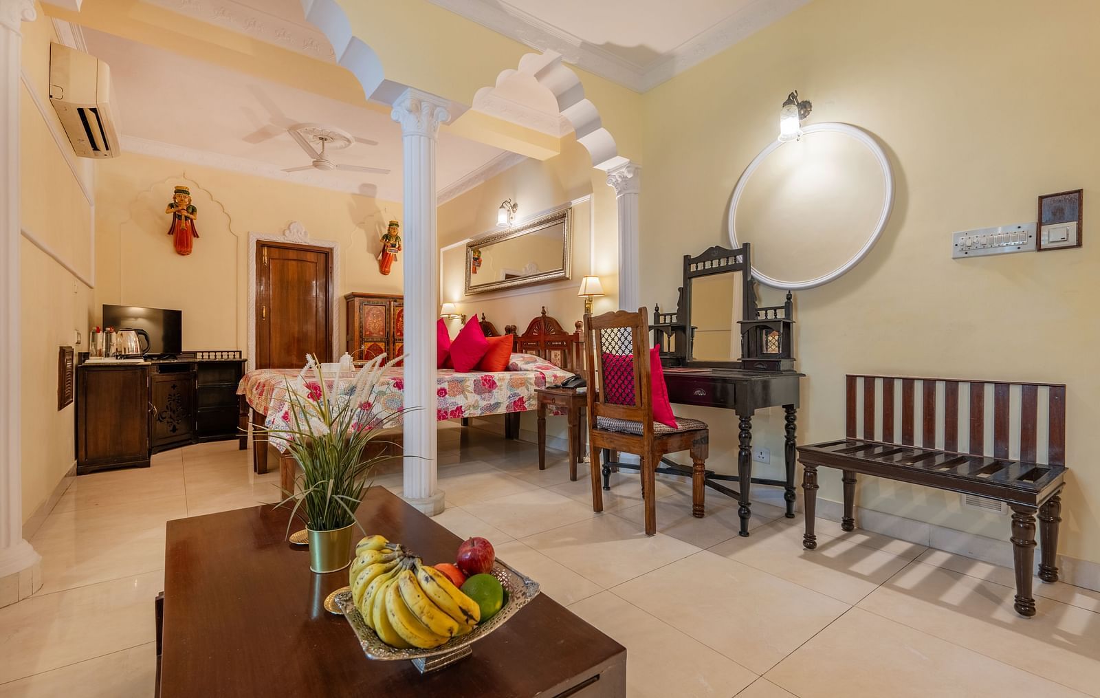 Spacious dining and sitting area with traditional décor and natural lighting at Dera Rawatsar, Jaipur