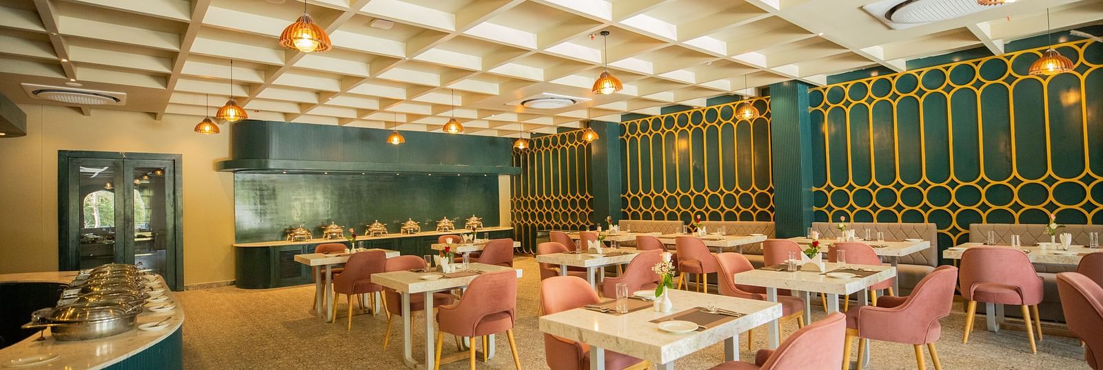 A dining setting of Blue Salt and Coffee at Essentia Luxury Resort & Spa, Udaipur. 