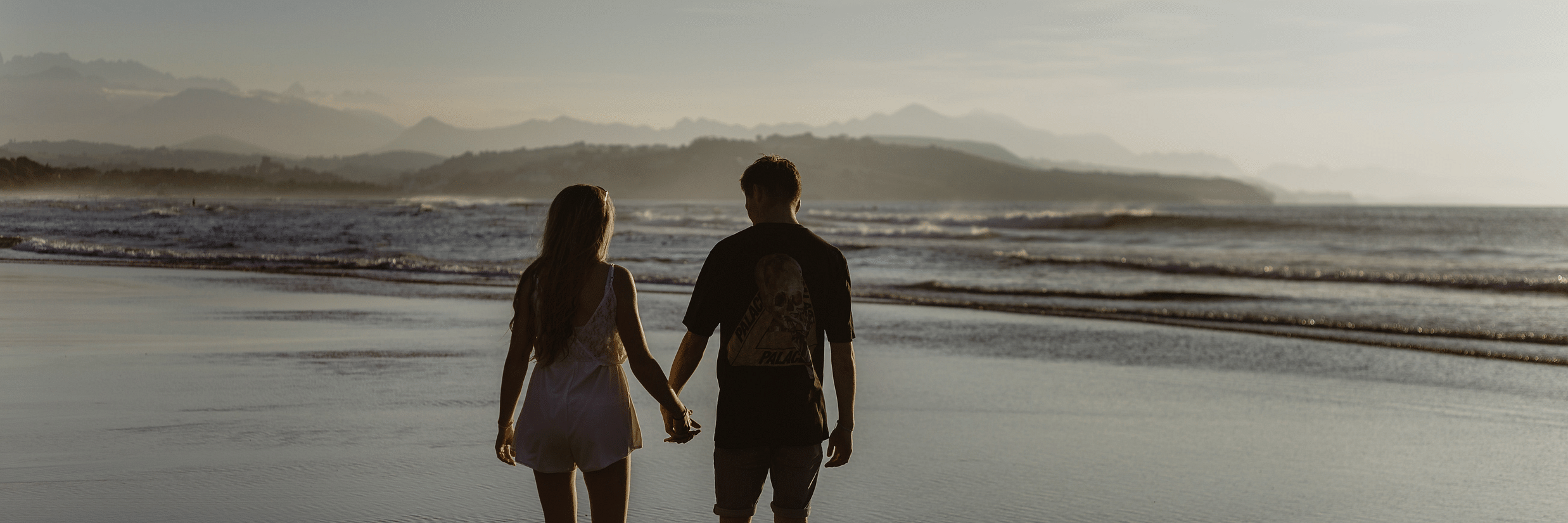 couple Walking on the beach @ Lamrin Ucassaim Hotel, Goa