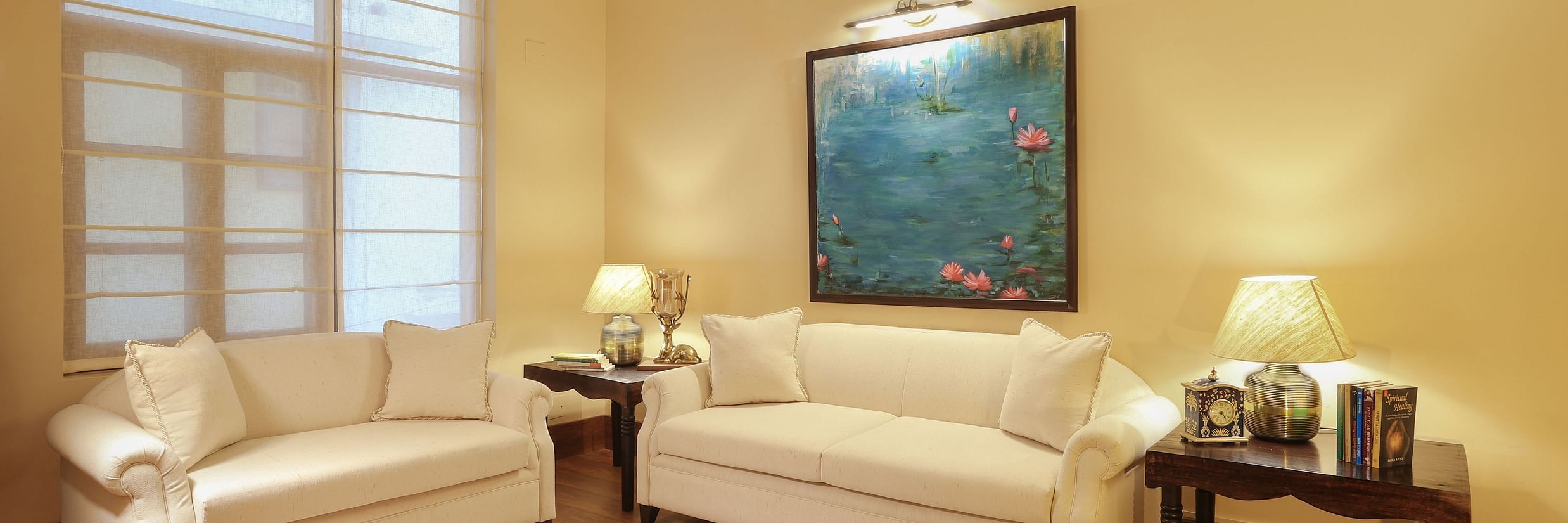 lounge features white sofas in an airy room - Lamrin Boutique Cottages Rishikesh