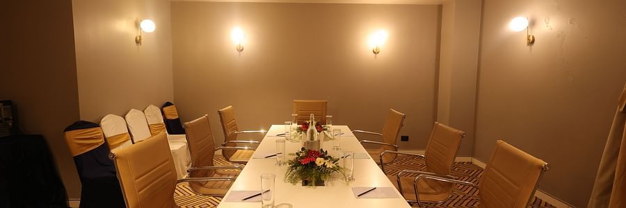 Spacious meeting room with rectangular table