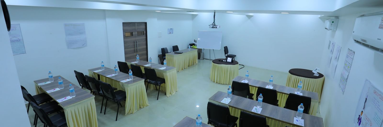 Classroom seating arrangement in the spacious Olive banquet hall, with ample lighting, at Highland Resort.