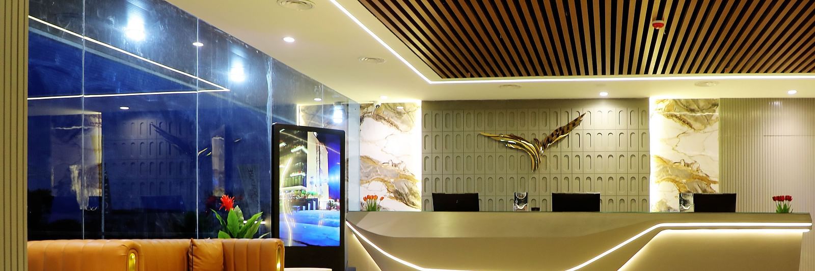 Lobby lounge at Town Square Suites with comfortable seating and sleek modern interiors