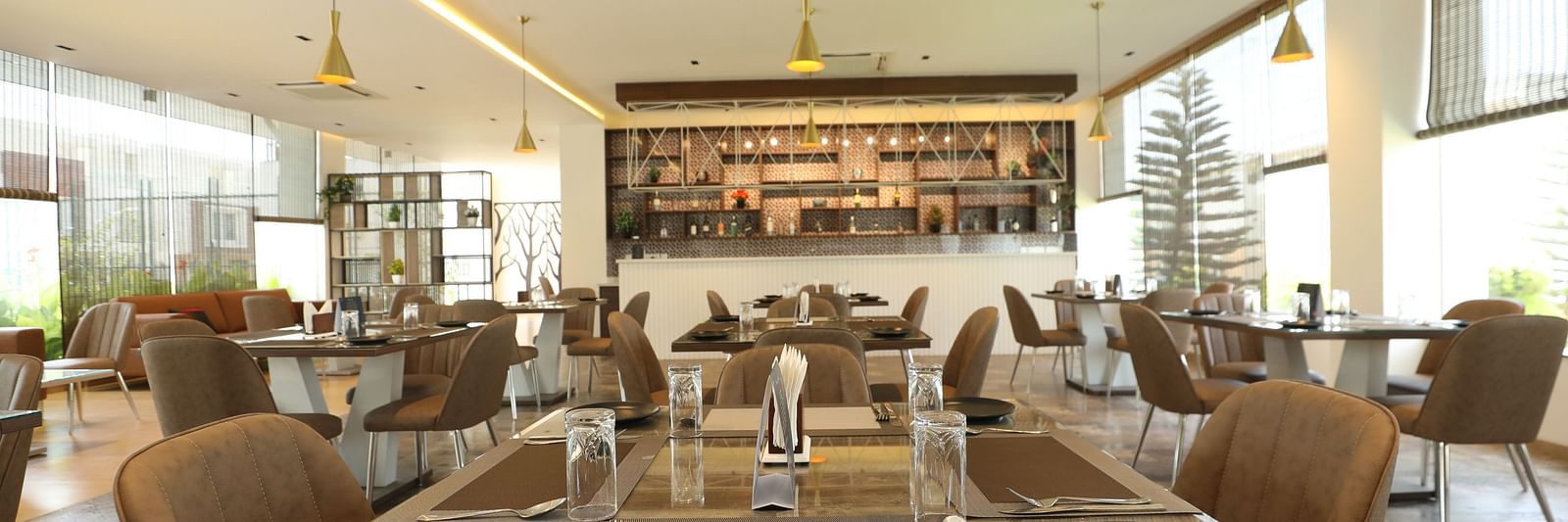 Dining setup in a restaurant - Welcome Inn Hotels