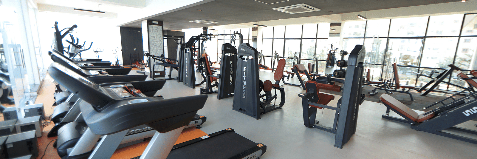 A gym with modern equipment - Welcome Inn Hotels