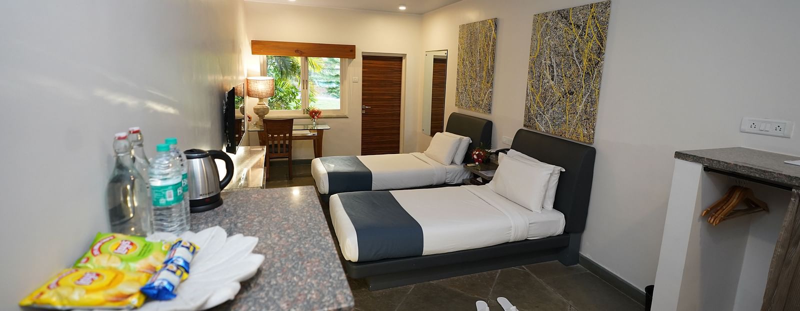 An image of a bedroom with twin beds - Argo By Trance, Goa