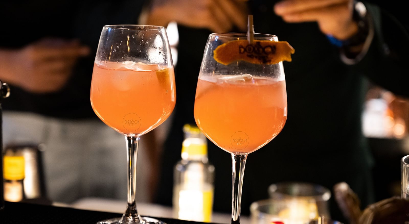 image of two wine glasses kept together with refreshing beverages at the alpenrose restaurant - the tattva boutique resort