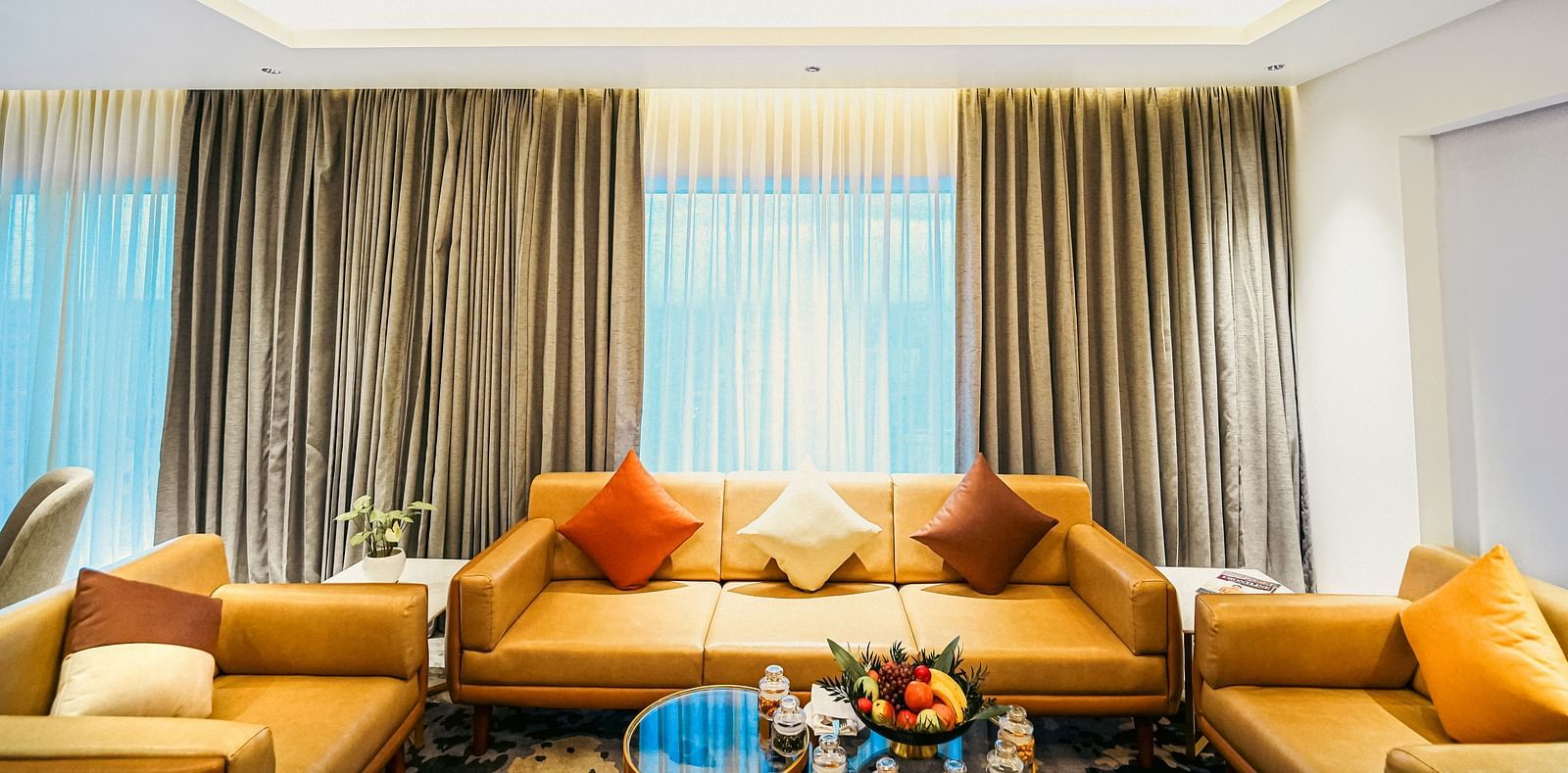 An image of the living area in our room in Madurai with couches placed around a coffee table