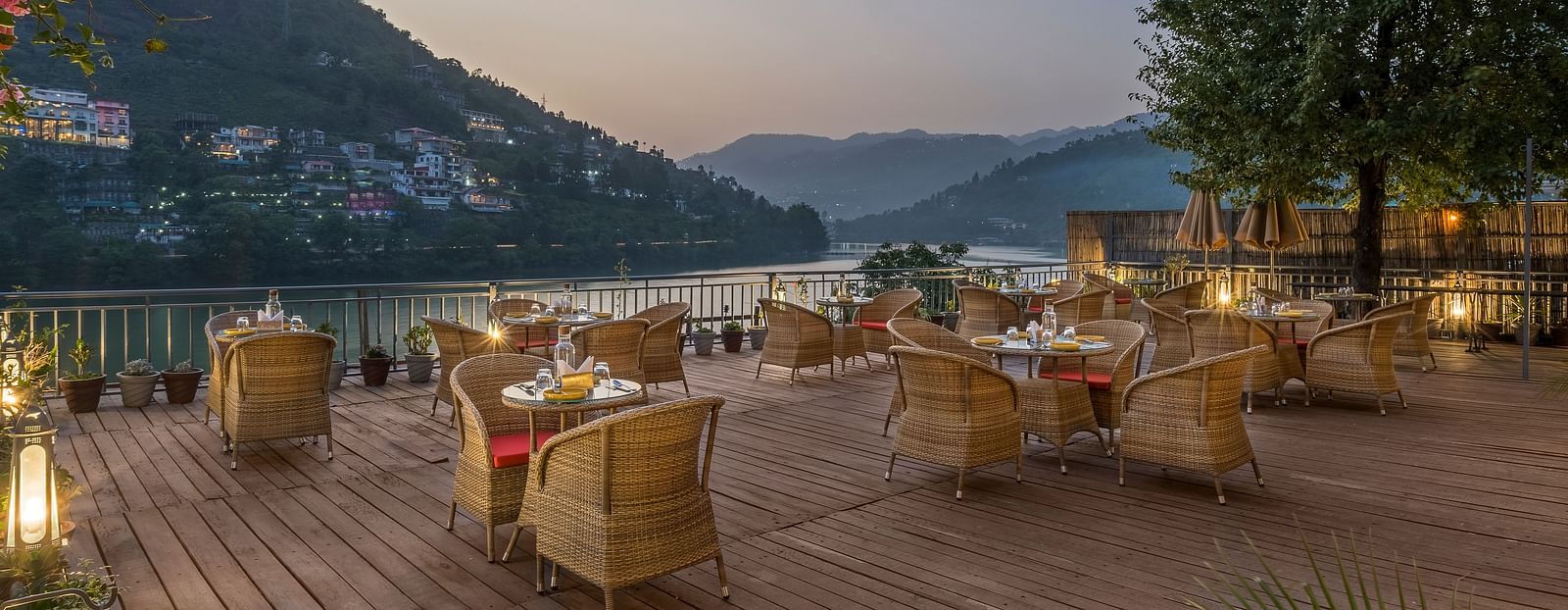  Outdoor L-Attitude Deck at Fishermen's Lodge, Bhimtal, offering a beautiful view, perfect for enjoying the serene landscape.