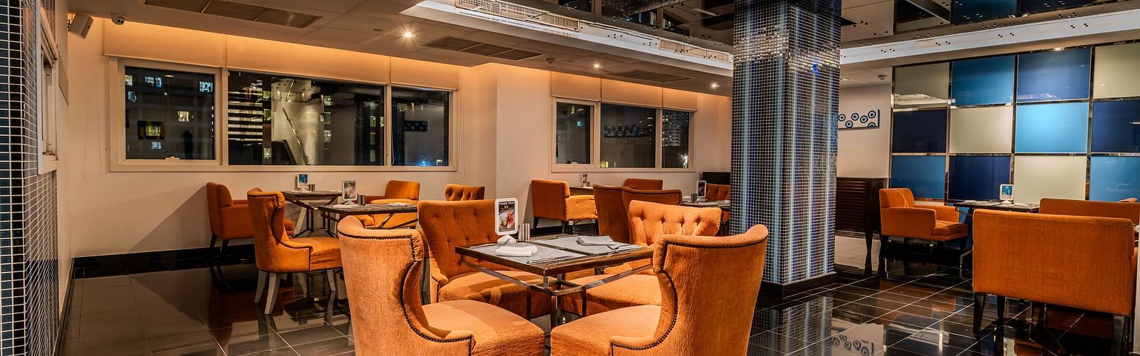 An overview of the seating arrangements inside flava restaurant - Night Hotel Bangkok