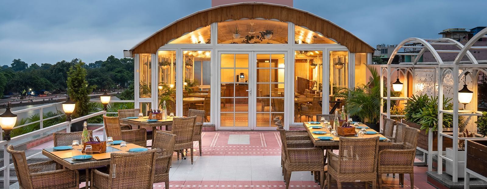 Rooftop restaurant with a glass roof.