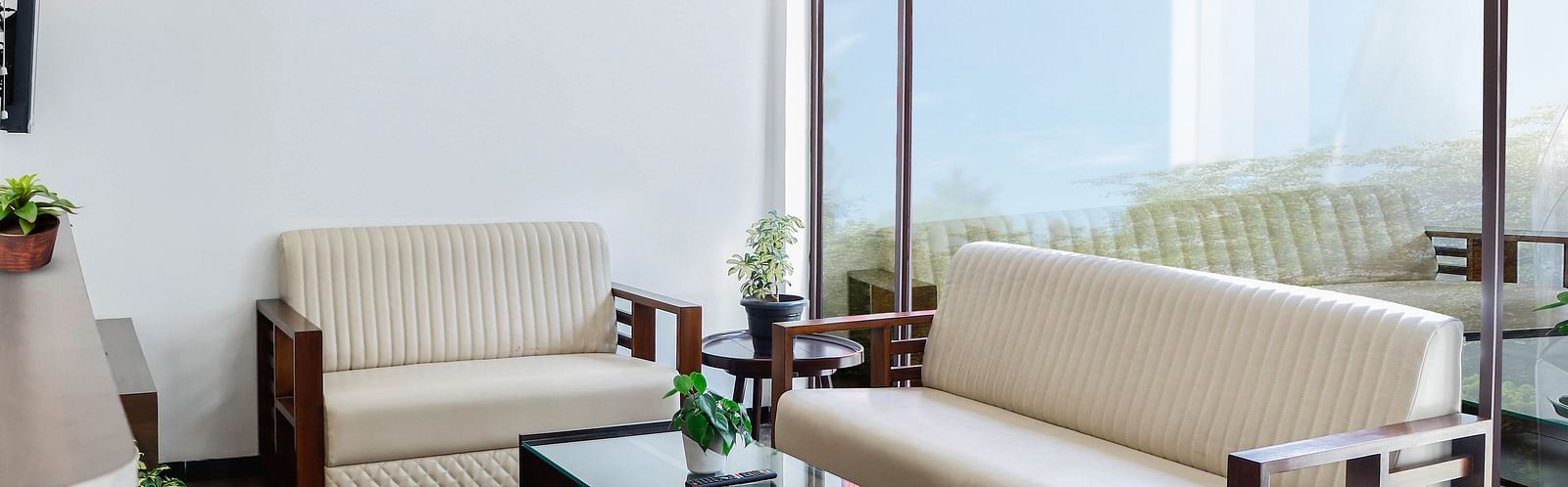 lobby area with comfortable seating at Hotel Vinayaga, Tiruppur