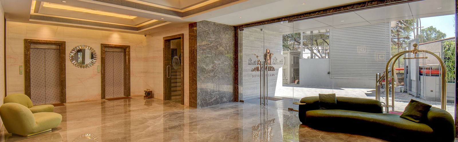 A luxurious lobby at a hotel with ambient lighting and sofa | The SSK Solitaire Boutique Hotel & Spa, Gangapur Road - Nashik