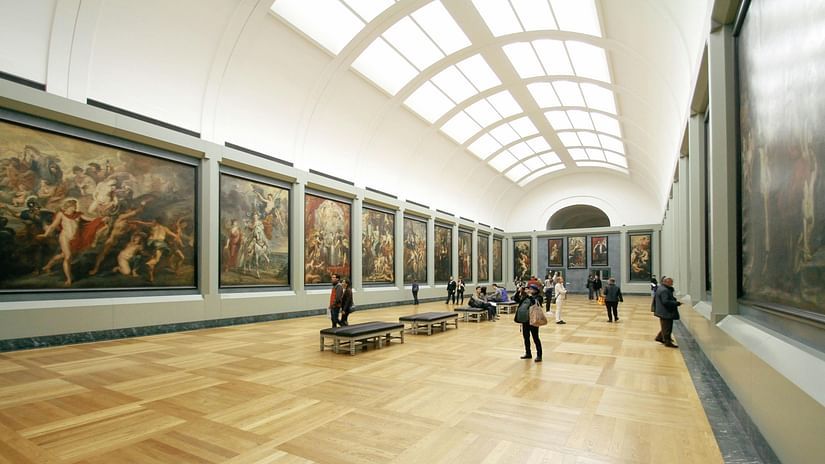 An image of an art gallery where visitors have come to visit it