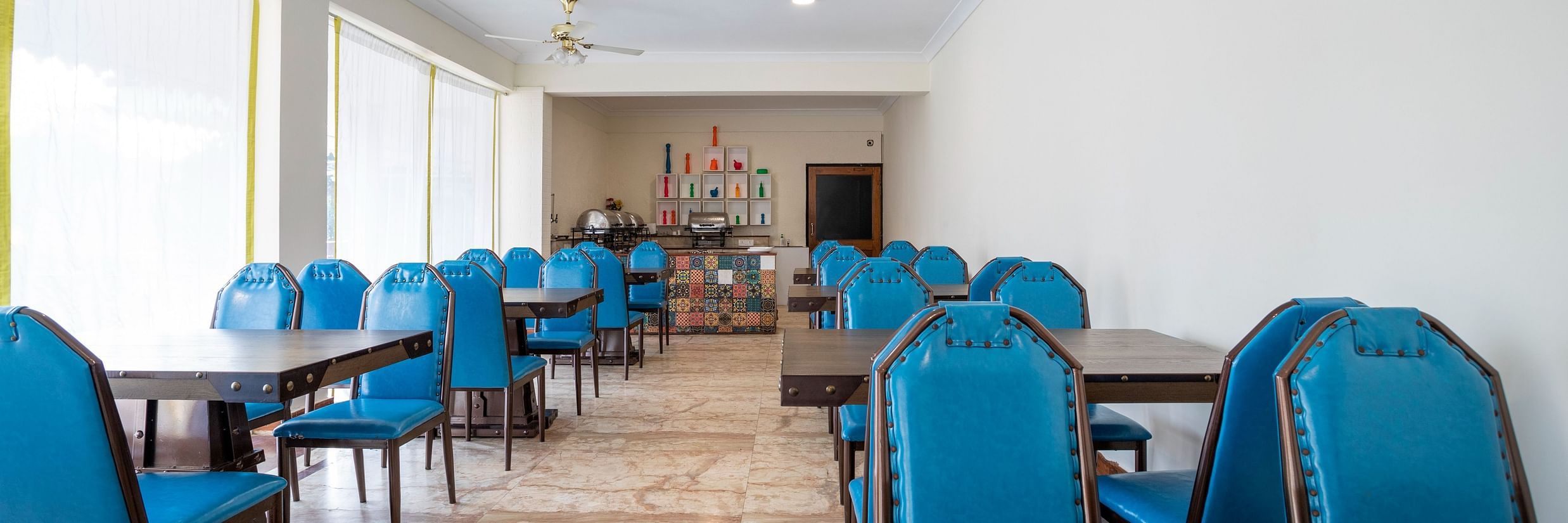 The dining arrangement at Divo - Stone Wood Riverfront Resort, Siolim
