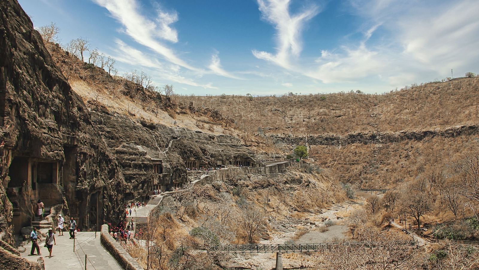 The expansive landscape of the rock caves with blue sky in the background