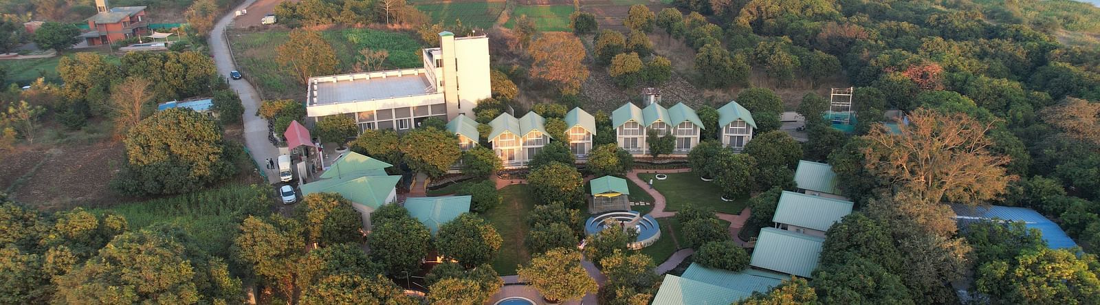 Overhead view of the facade of Mango Leaf Lake Resort, Pune