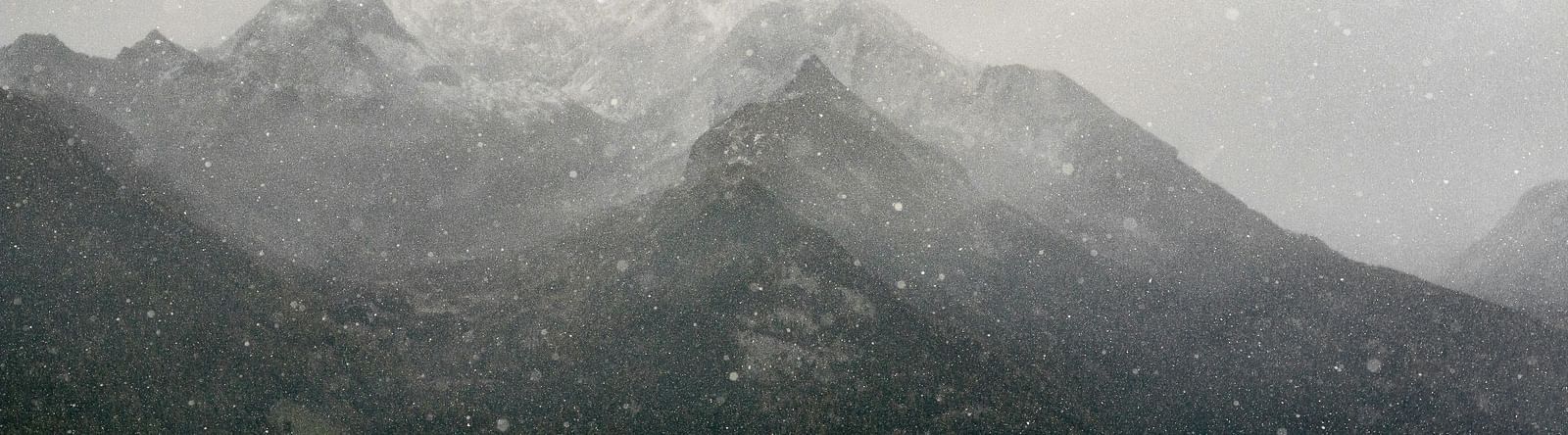 Scenic view of the mountains during snow.