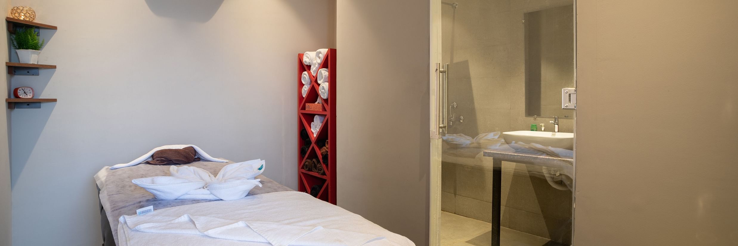 image of the spa featuring an air conditioned room with a wide bed at sibaya beach resort, morjim beach