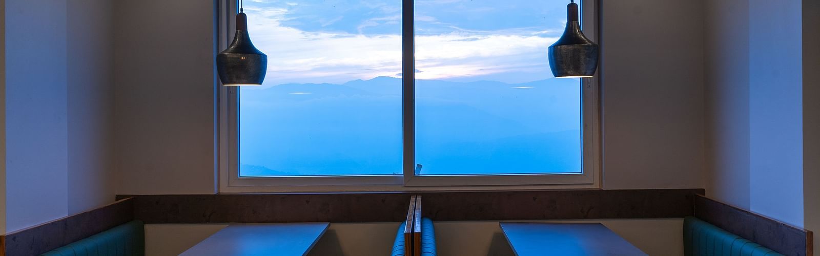 image of the restaurant with amazing mountain view at The Soma by Avianna Group, Darjeeling